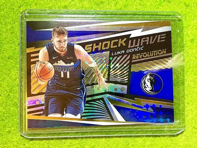 LUKA DONCIC PRIZM CARD JERSEY #77 MAVERICKS 2019-20 Panini REVOLUTION SHOCK WAVE