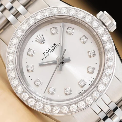 ROLEX LADIES OYSTER PERPETUAL 67230 SILVER DIAL STAINLESS STEEL DIAMOND WATCH